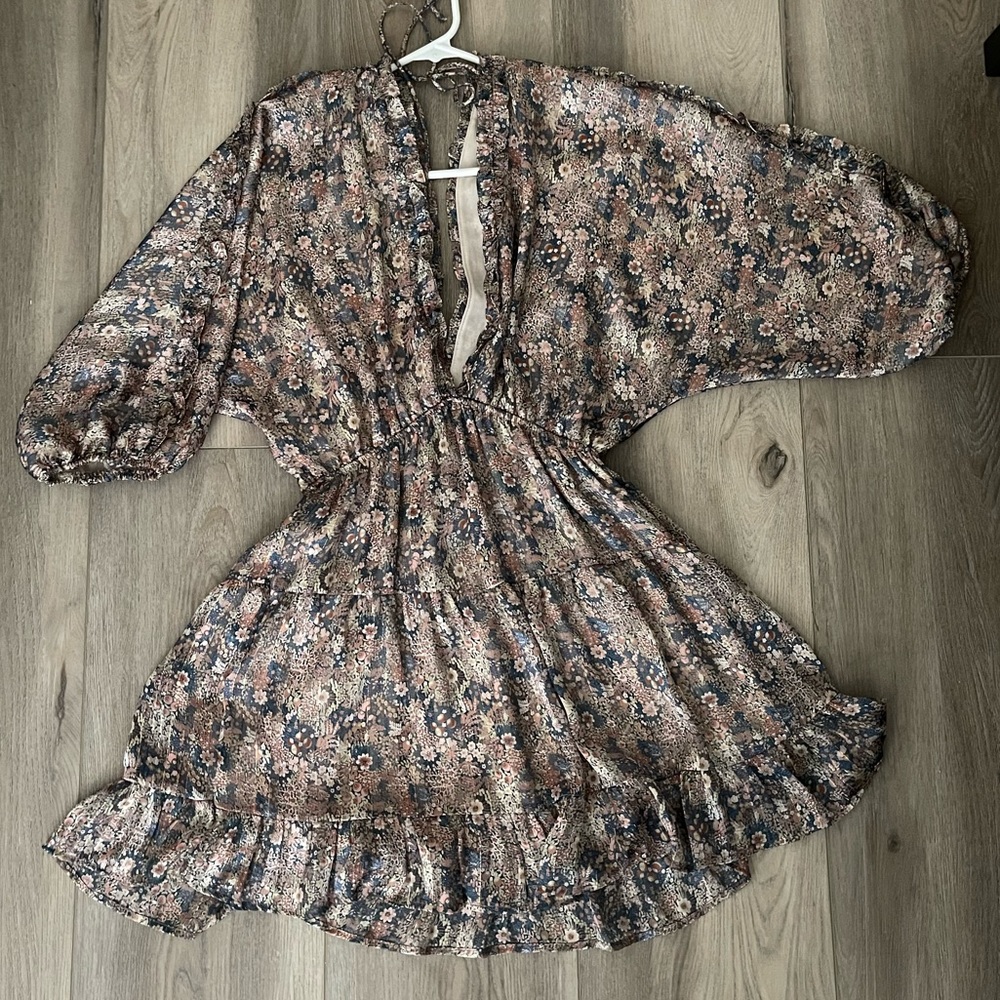 Vici Ruffled tiered babydoll dress. Size Medium. V shape at front and back.